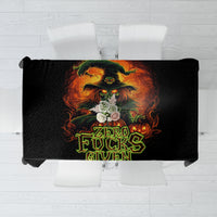 Black tablecloth featuring fiery skull artwork and multicolor “Zero F**ks Given” print