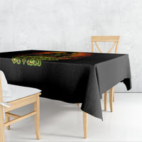 Black tablecloth with skull graphic and green “Zero F**ks Given” text