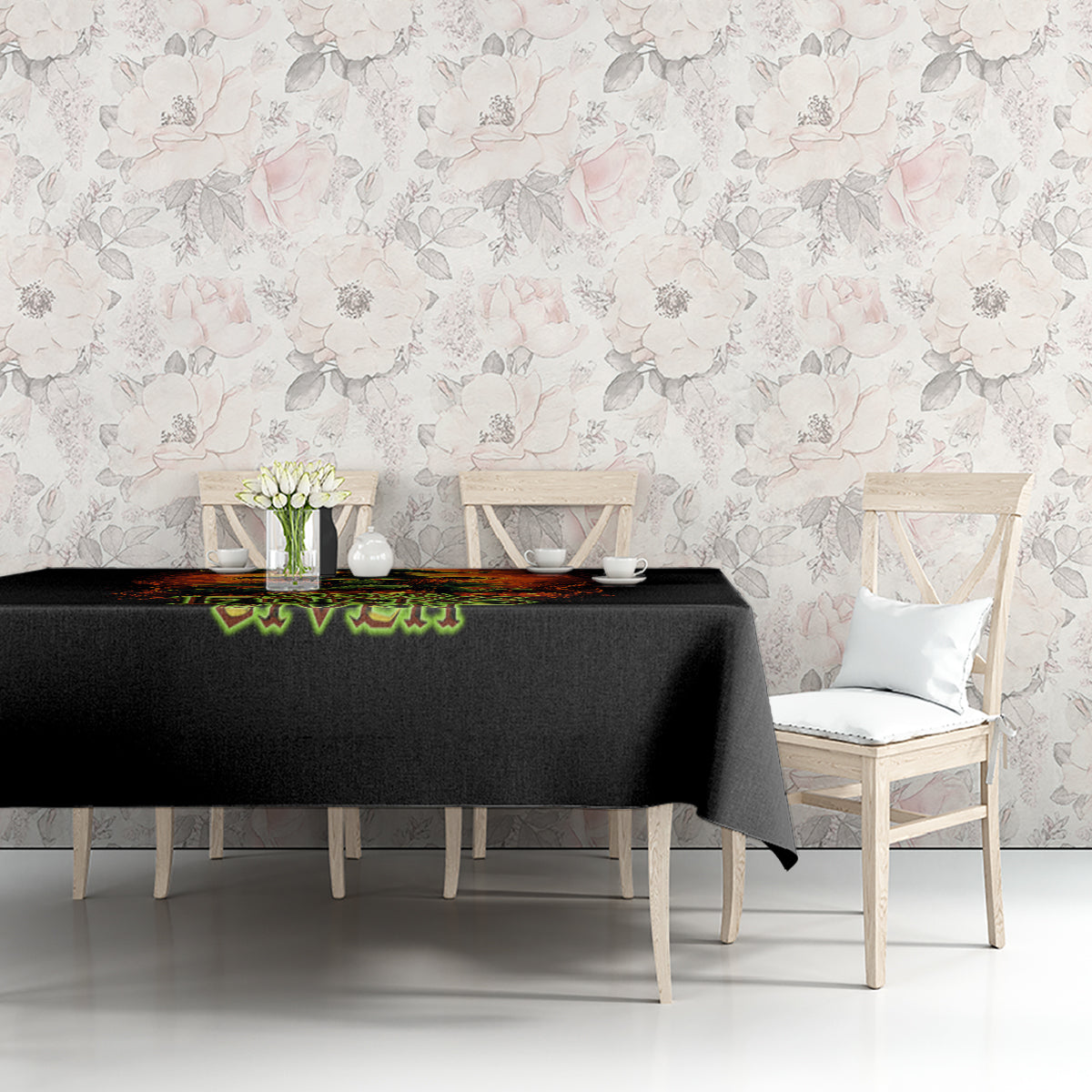 Black tablecloth with fiery skull artwork and green “Zero F**ks Given” text
