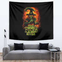Black tapestry featuring a fiery skull portrait with “Zero Fucks Given” text