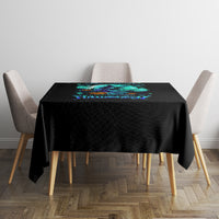 Black Halloween tablecloth with teal witch skull centerpiece