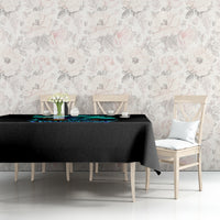 Black tablecloth with teal witch skull graphic on dining table