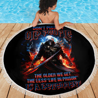 Round black beach blanket with skull warrior artwork and white fringe, 150 cm diameter