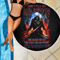 Round black beach blanket with skull warrior design and white fringe, 150 cm diameter