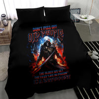 Black duvet bedding set with warrior skull print, neon red-blue flames, two matching pillows