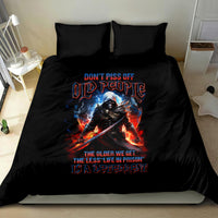 Black duvet cover bedding set with warrior skull scene in red and blue flames, two pillows