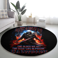 Black round carpet with warrior skull, flames and “life in prison” themed text