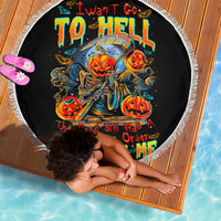 Black round beach blanket with devil skull pumpkin graphic and white fringe edge