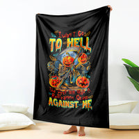 Black rectangular throw blanket showing pumpkin skull skeleton with “TO HELL” and “AGAINST ME”.
