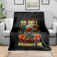 Black graphic throw blanket with pumpkin skull skeleton art and bold “AGAINST ME” text.