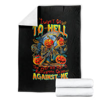 Black throw blanket folded with pumpkin skull skeleton design and “AGAINST ME” headline text.