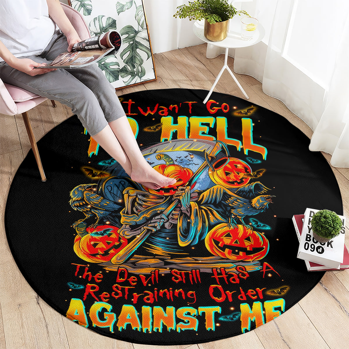 Black round horror graphic carpet with skull rider design and bold multicolor lettering