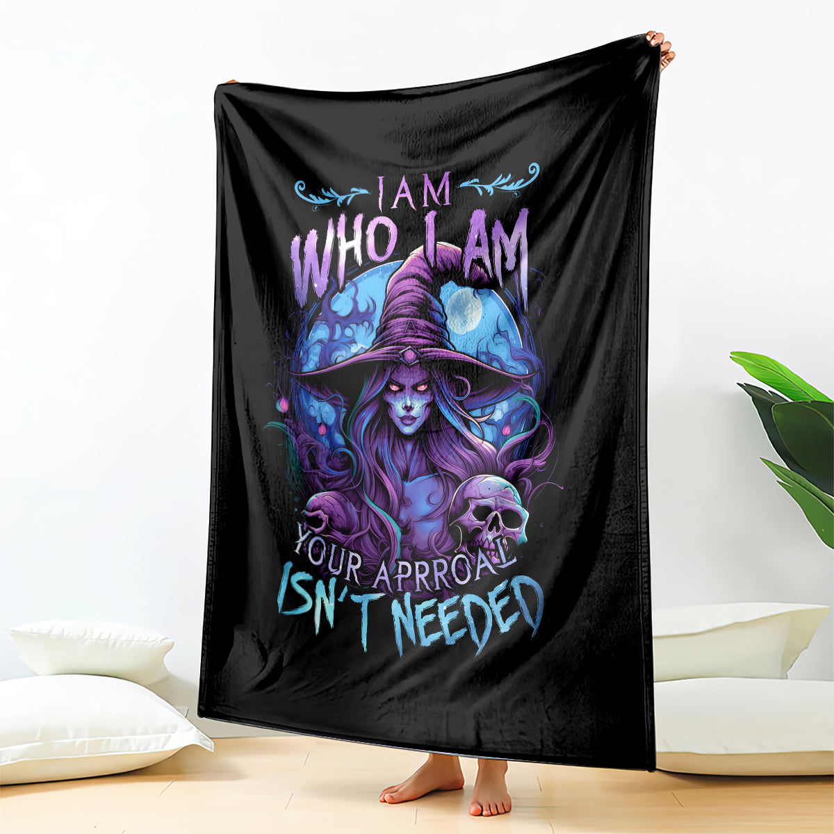 Black blanket draped with purple witch, blue flames, skull and slogan graphic