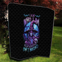 Black quilt blanket with quilted diamond pattern and purple-blue witch skull graphic, rounded
