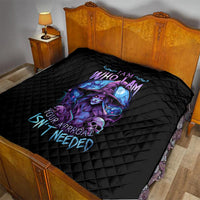 Black quilt blanket with quilted diamond pattern and purple-blue witch skull design on bed