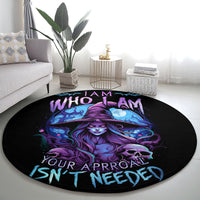 Black round rug with purple-blue witch and skull illustration, WHO I AM and ISN'T NEEDED text