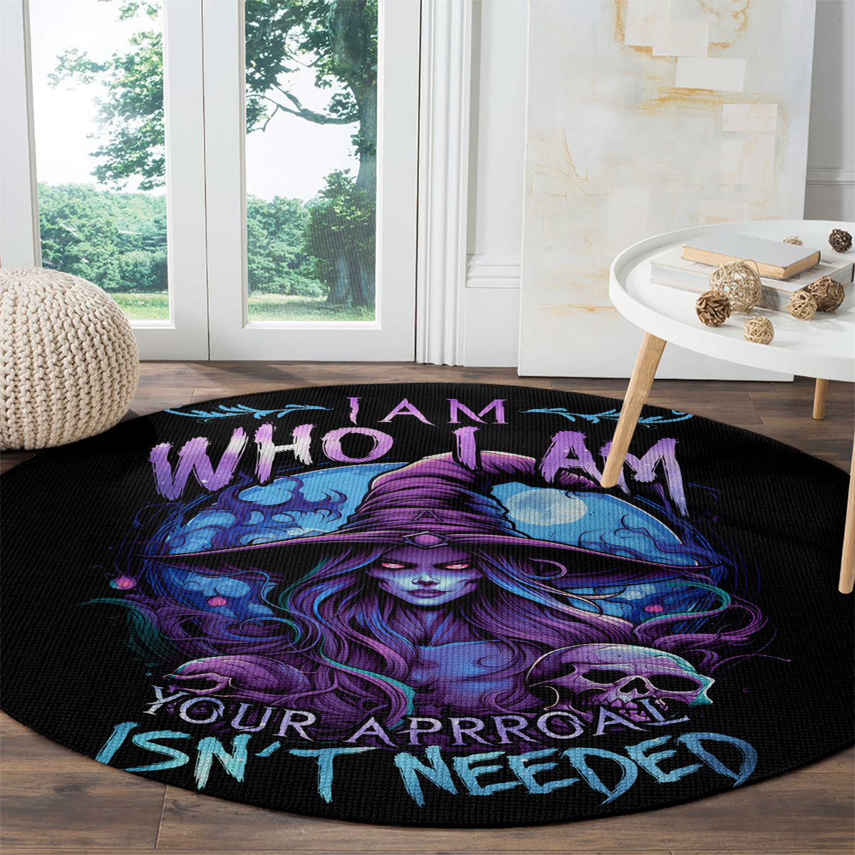Black round rug with purple-blue witch and skull, WHO I AM and ISN'T NEEDED lettering in teal