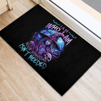 Black rubber doormat with purple witch skull graphic and “I am who I am” text