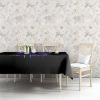Black tablecloth on a console table with purple witch skull graphic detail