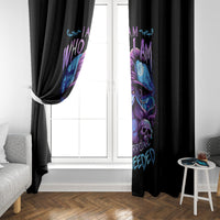 Black curtain panels with witch skull illustration hanging on window, side view