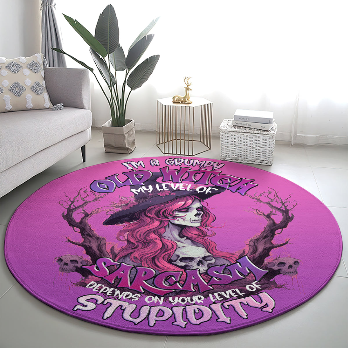 Round pink rug with grumpy witch skull design and 'Sarcasm' lettering