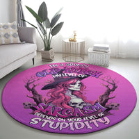 Round pink rug with grumpy witch skull design and 'Sarcasm' lettering