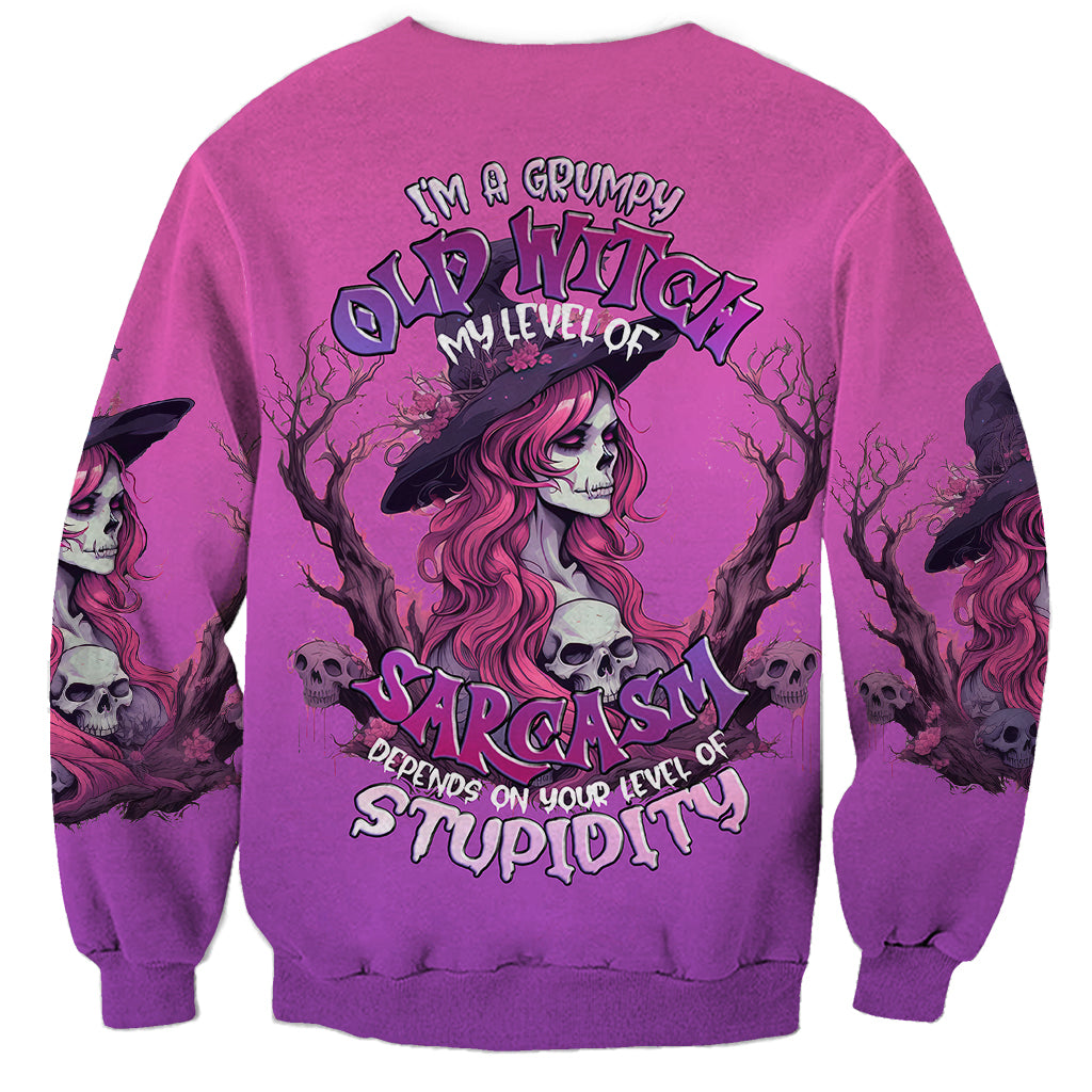 Pink sweatshirt with witch skull graphic and sarcastic text, crew neck long sleeves
