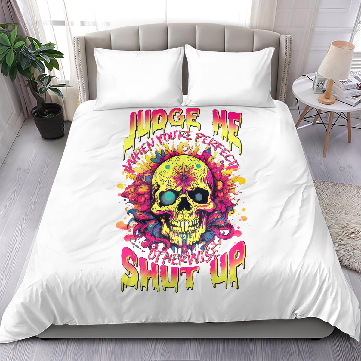 White bedding set with colorful skull graphic and bold lettering