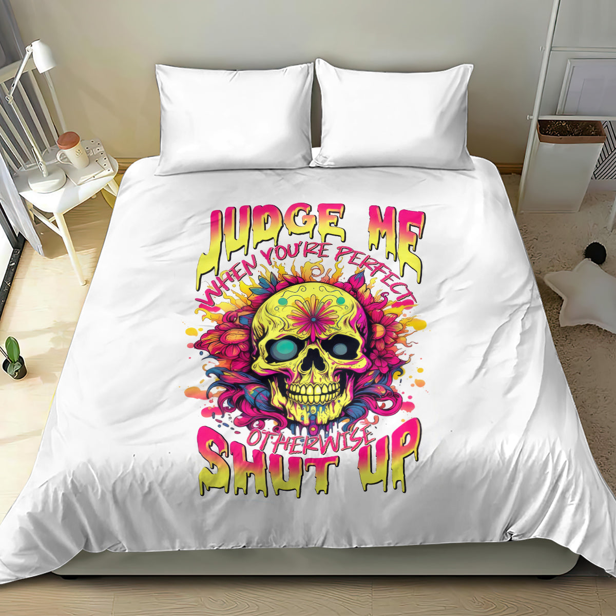 White duvet cover and pillowcases with colorful skull design and graffiti-style text