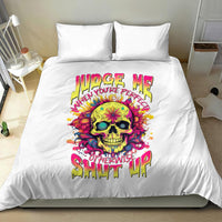 White duvet cover and pillowcases with colorful skull design and graffiti-style text