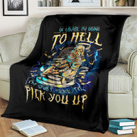 Black mummy skull graphic throw blanket over couch, blue lightning around central skull artwork