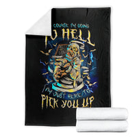 Black mummy skull graphic blanket with folded white towels, bold blue lightning and yellow text