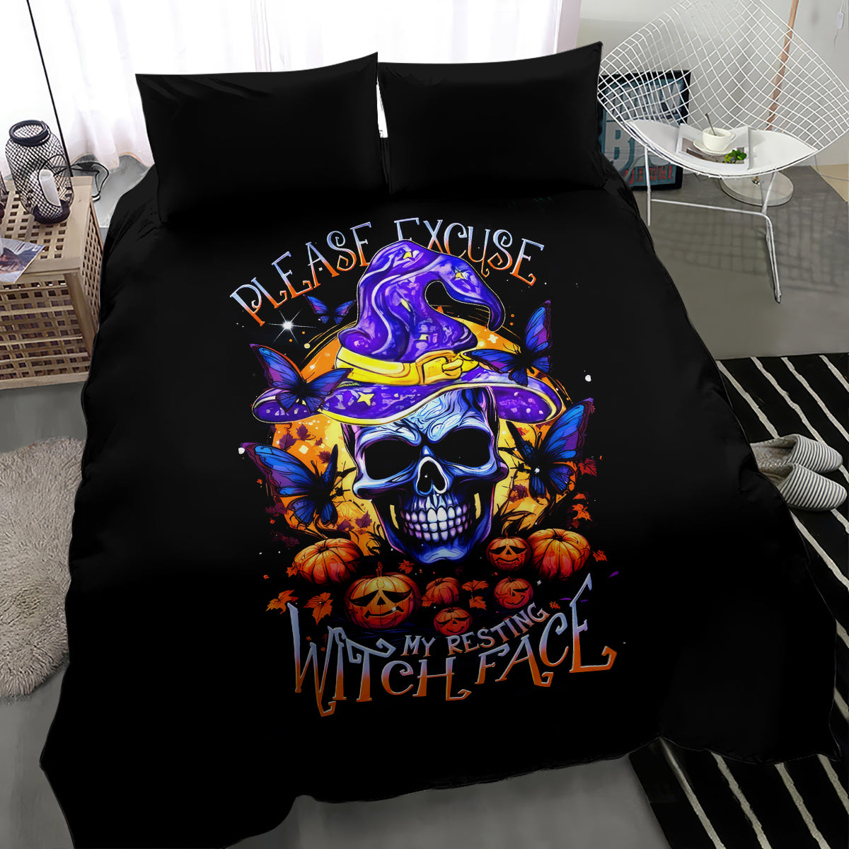 Black Halloween bedding set with purple witch skull graphic on duvet and two dark pillows