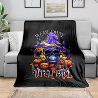 Black Halloween skull blanket with purple witch hat and orange pumpkin graphic