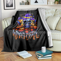 Black Halloween blanket featuring skull with purple witch hat and orange pumpkin graphics