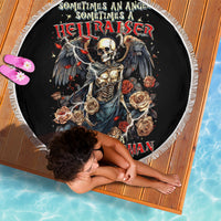 Black round beach blanket with white fringe and angel-skull hellraiser artwork