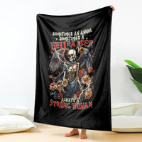Black draped throw blanket with angel skull, wings, roses, and bold graphic text