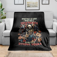 Black throw blanket with skull-and-angel graphic and roses, printed design