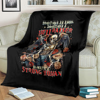 Black blanket with angel skull artwork, roses, and winged figure print