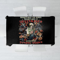 Black tablecloth with full angel-skull graphic and red banner text