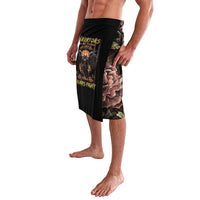 Black lavelava skirt with warrior portrait graphic and floral leaf panel