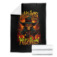 Black witch skull blanket on white background with fiery skull hat and flame spell design