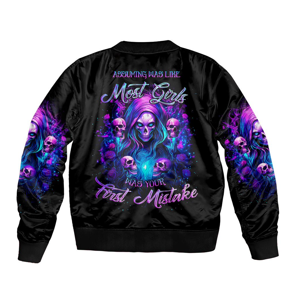 Black bomber jacket with purple witch skull graphic on back, ribbed cuffs and hem