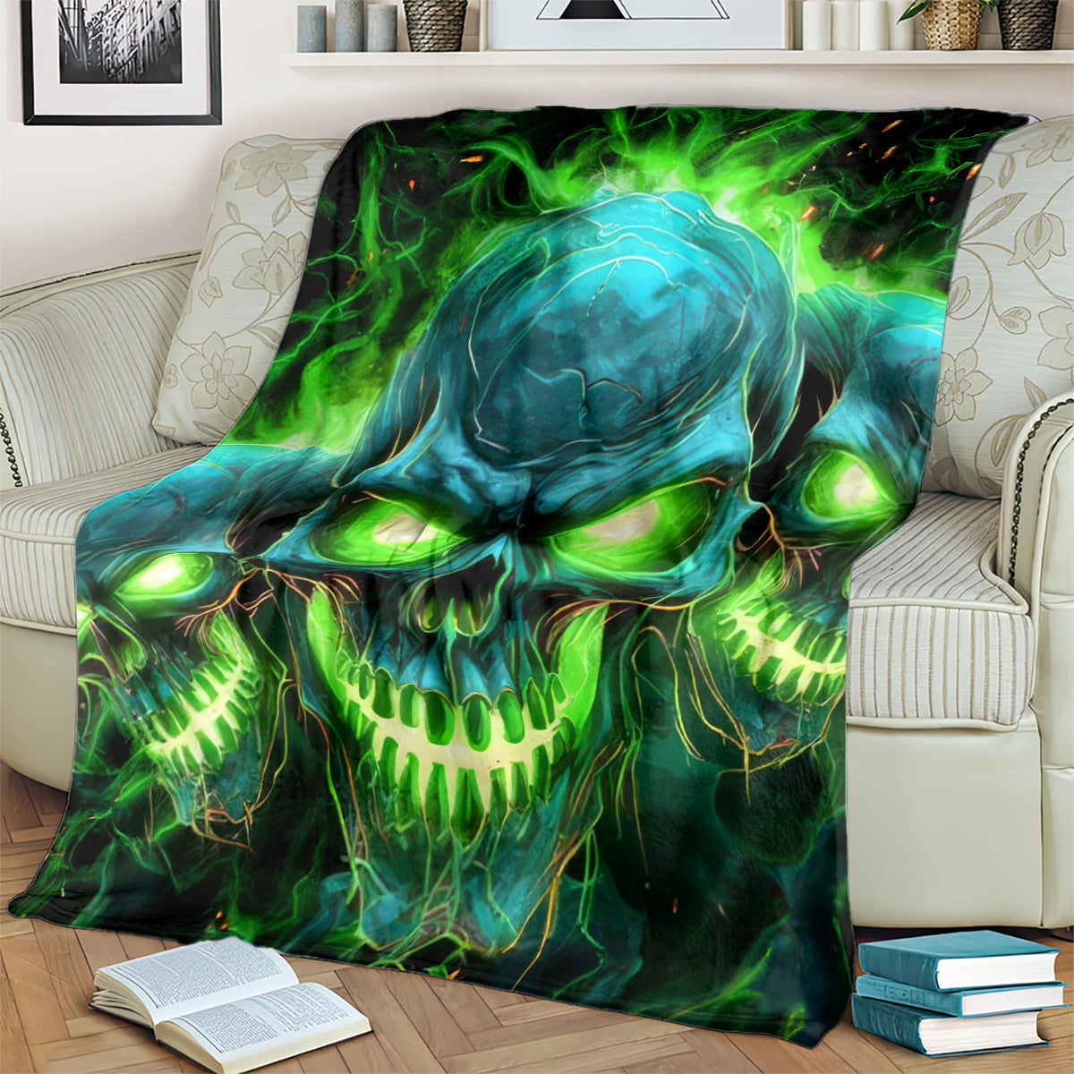 Skull flame graphic blanket, teal skull with bright green flames, draped across chair