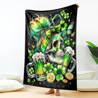 Black throw blanket featuring a skull, rainbow hair, clovers, and coin charms design