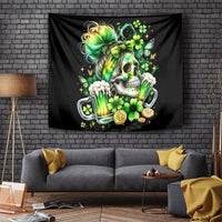 Black wall tapestry featuring a skull with green hair holding beer mugs and shamrocks