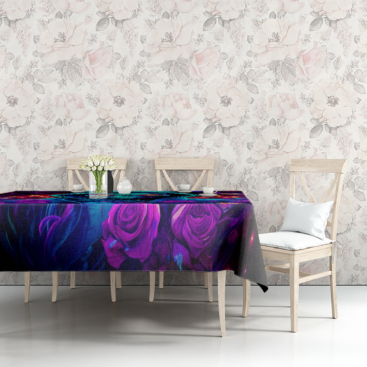 Black tablecloth with purple and blue rose swirls and neon skull graphic across the table.