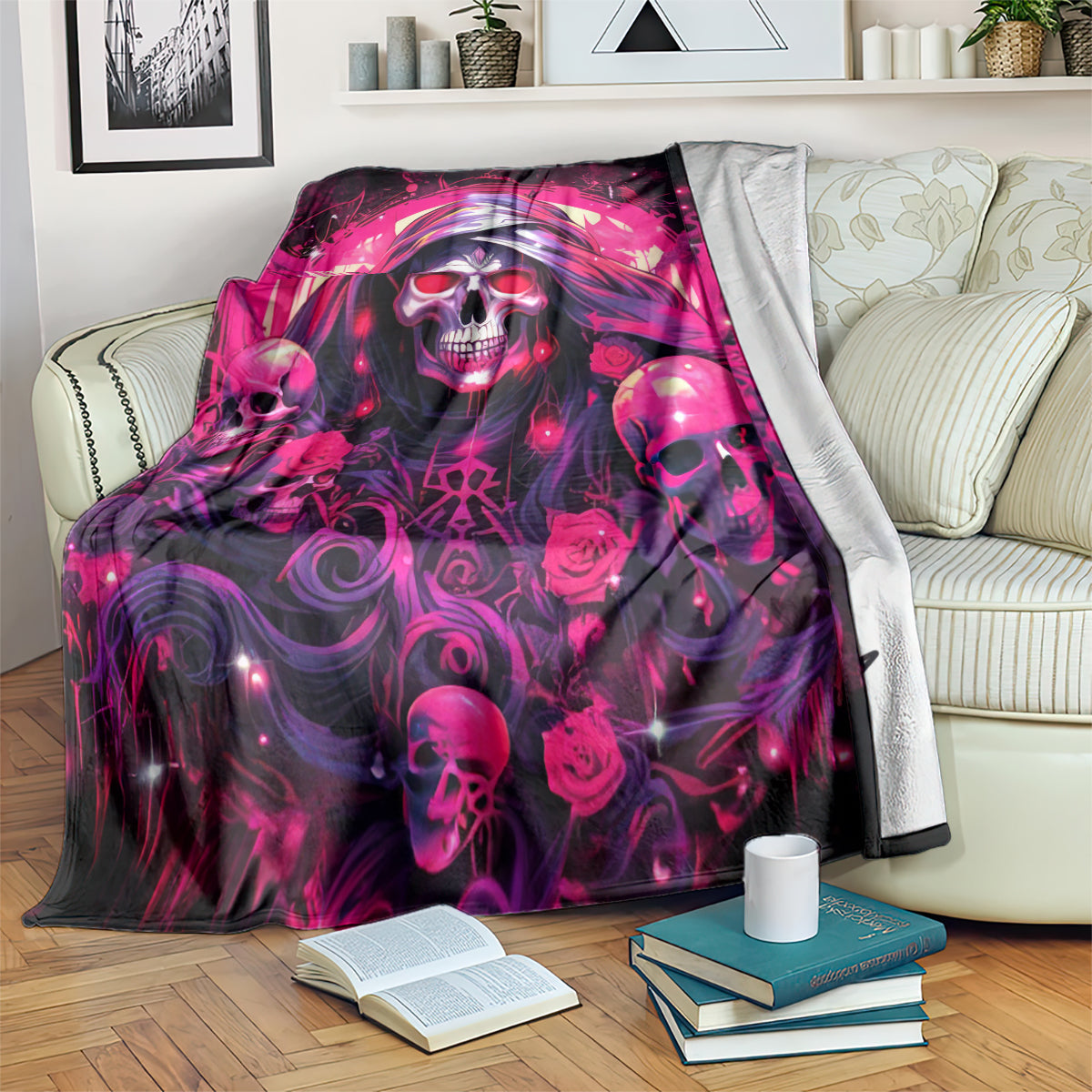 Skull rose blanket with magenta and black neon graphic, draped on bed