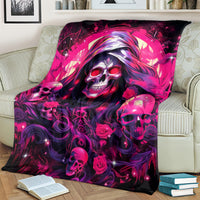 Skull rose blanket with close-up magenta skull and rose graphic, draped