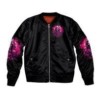 Black bomber jacket with full front zipper and pink skull patch graphic, ribbed hem